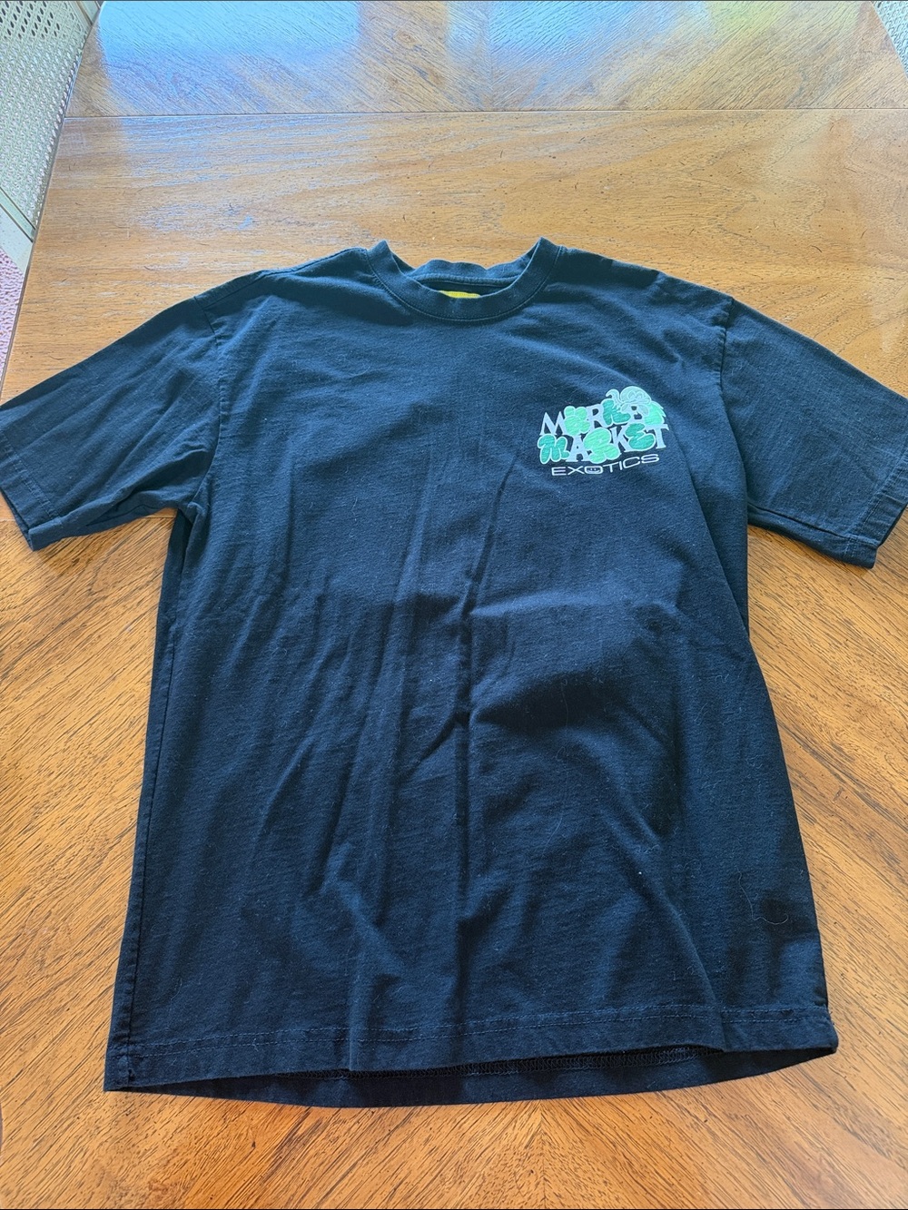 Market Market Exotic Imports T-Shirt